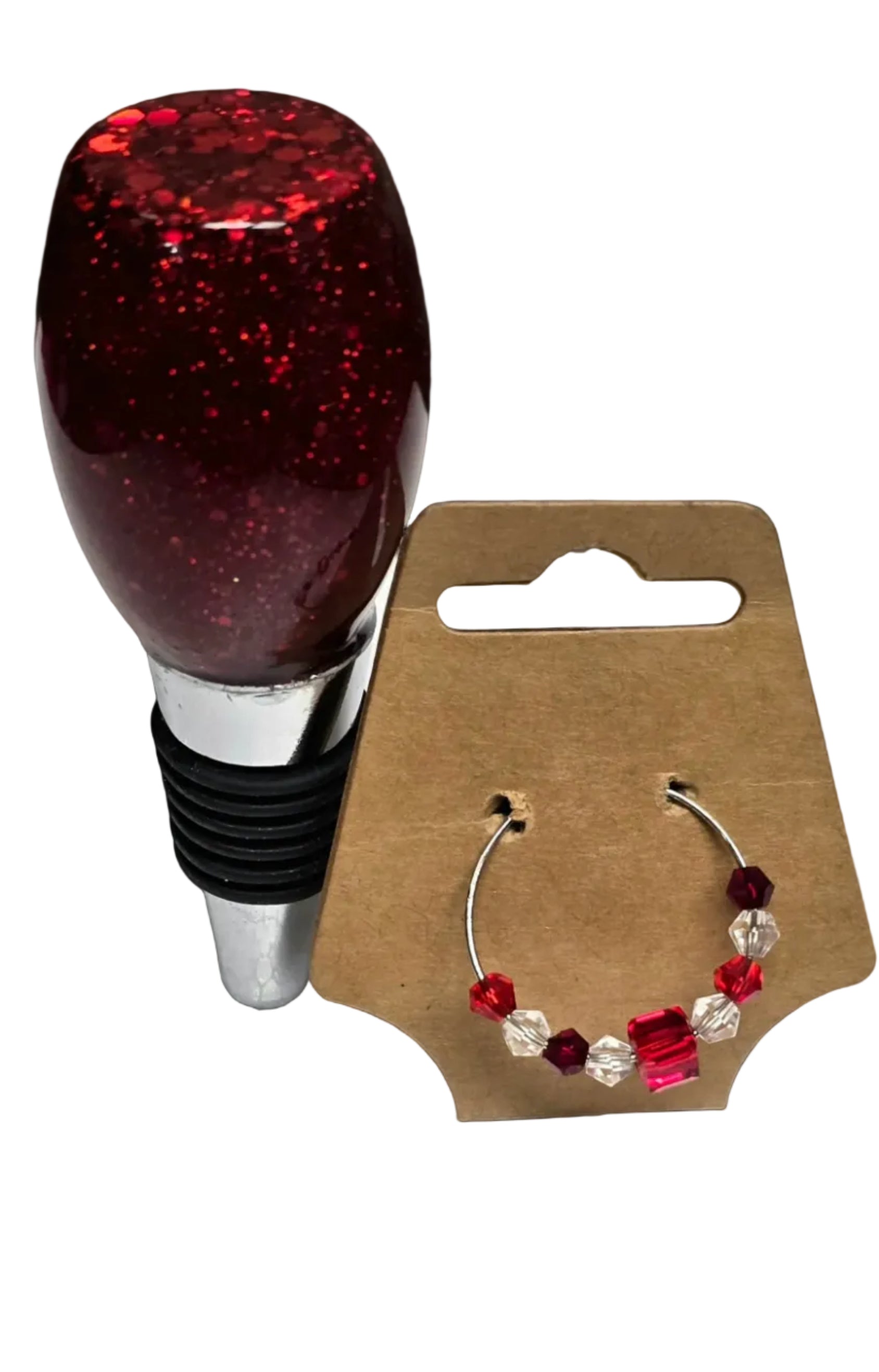 These hand-made epoxy resin wine stoppers provide an airtight seal to preserve the quality and flavor of your wine. Crafted to ensure durability and efficiency, each stopper is designed to minimize oxidation, maintaining optimal freshness for longer periods. Matching wine glass identifier ring included.Ideal for any wine enthusiast looking to enhance their preservation methods.
